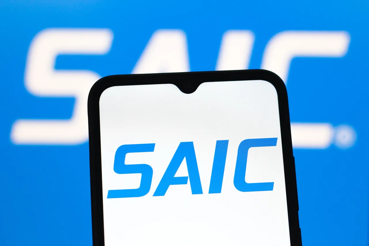 In this photo illustration, the Saic (Science Applications International Corporation) logo is seen displayed on a smartphone screen. (Photo Illustration by Thomas Fuller/SOPA Images/LightRocket via Getty Images)