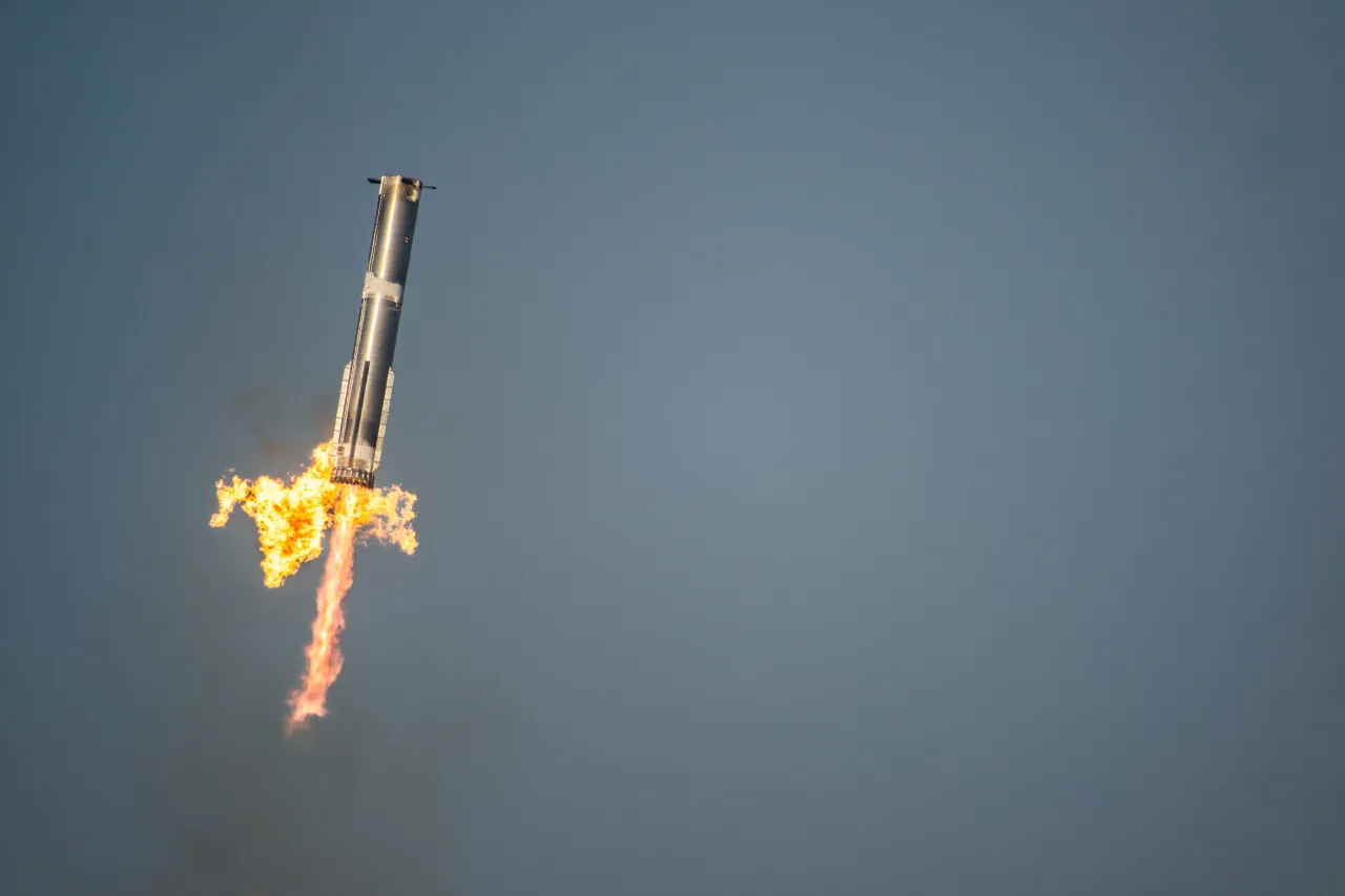  The SpaceX Starship Flight 8 booster returns returns from its ascent at Boca Chica beach on March 06, 2025 in Boca Chica Beach, Texas. 