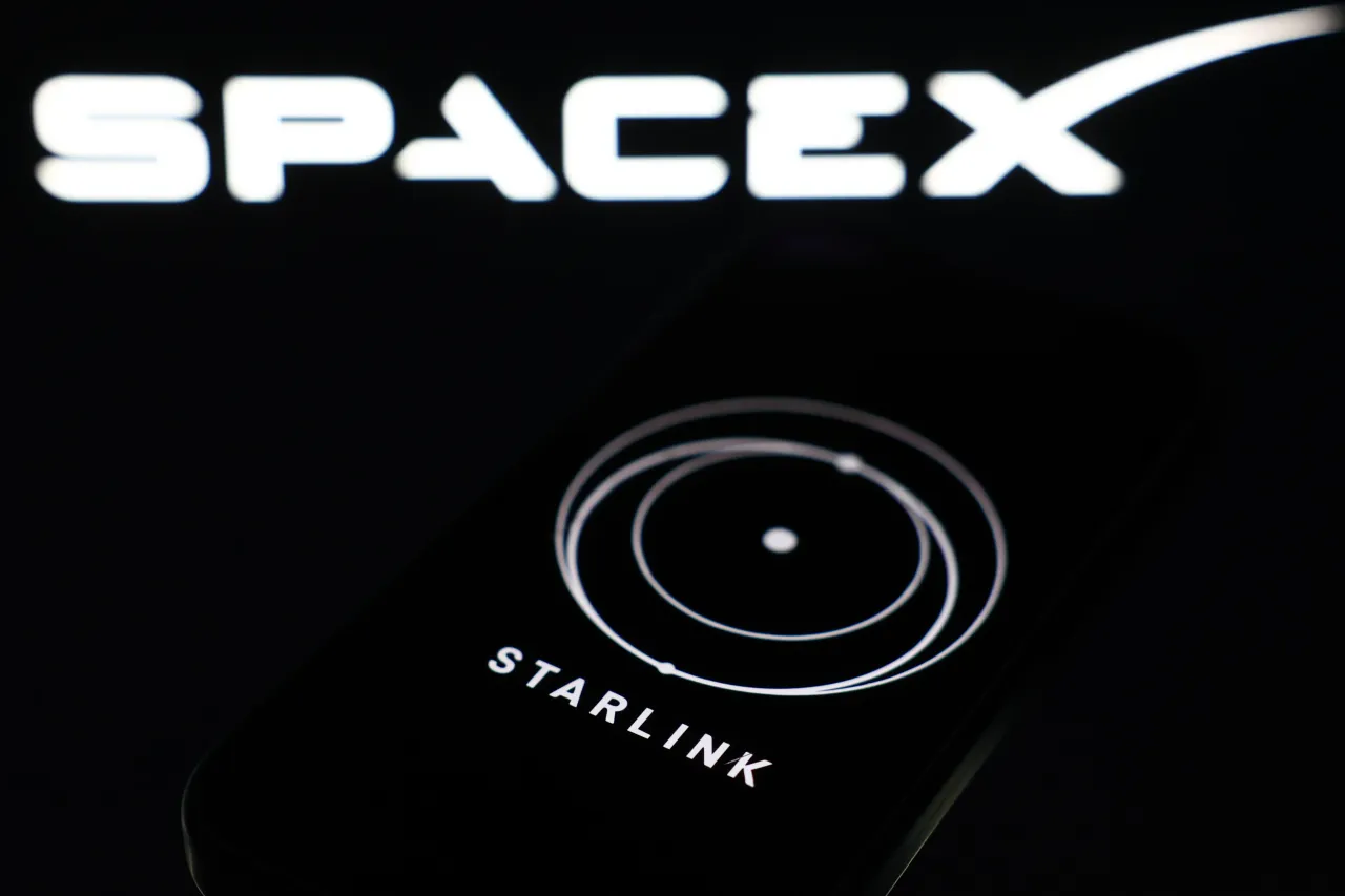 SpaceX logo displayed on a laptop screen and Starlink logo displayed on a phone screen are seen in this illustration photo taken in Krakow, Poland on March 11, 2025. (Photo by Jakub Porzycki/NurPhoto via Getty Images)