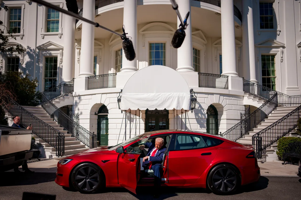 U.S. President Donald Trump gets out of aTesla Model S on the South Lawn of the White House on March 11, 2025 in Washington, DC. (Photo by Andrew Harnik/Getty Images)