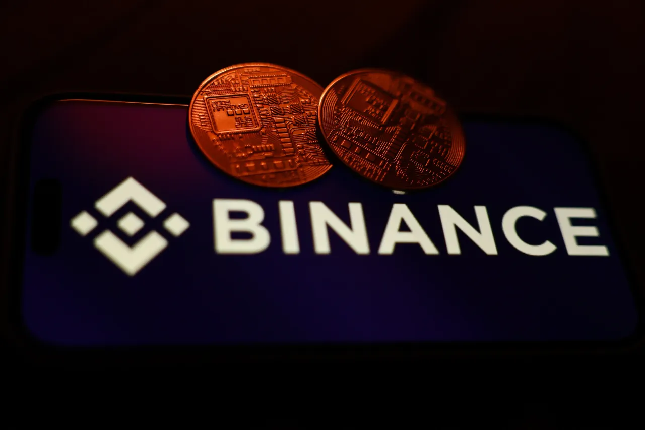 Representation of cryptocurrency and Binance logo displayed on a phone screen are seen in this illustration photo taken in Krakow, Poland on March 13, 2025. (Photo by Jakub Porzycki/NurPhoto via Getty Images)