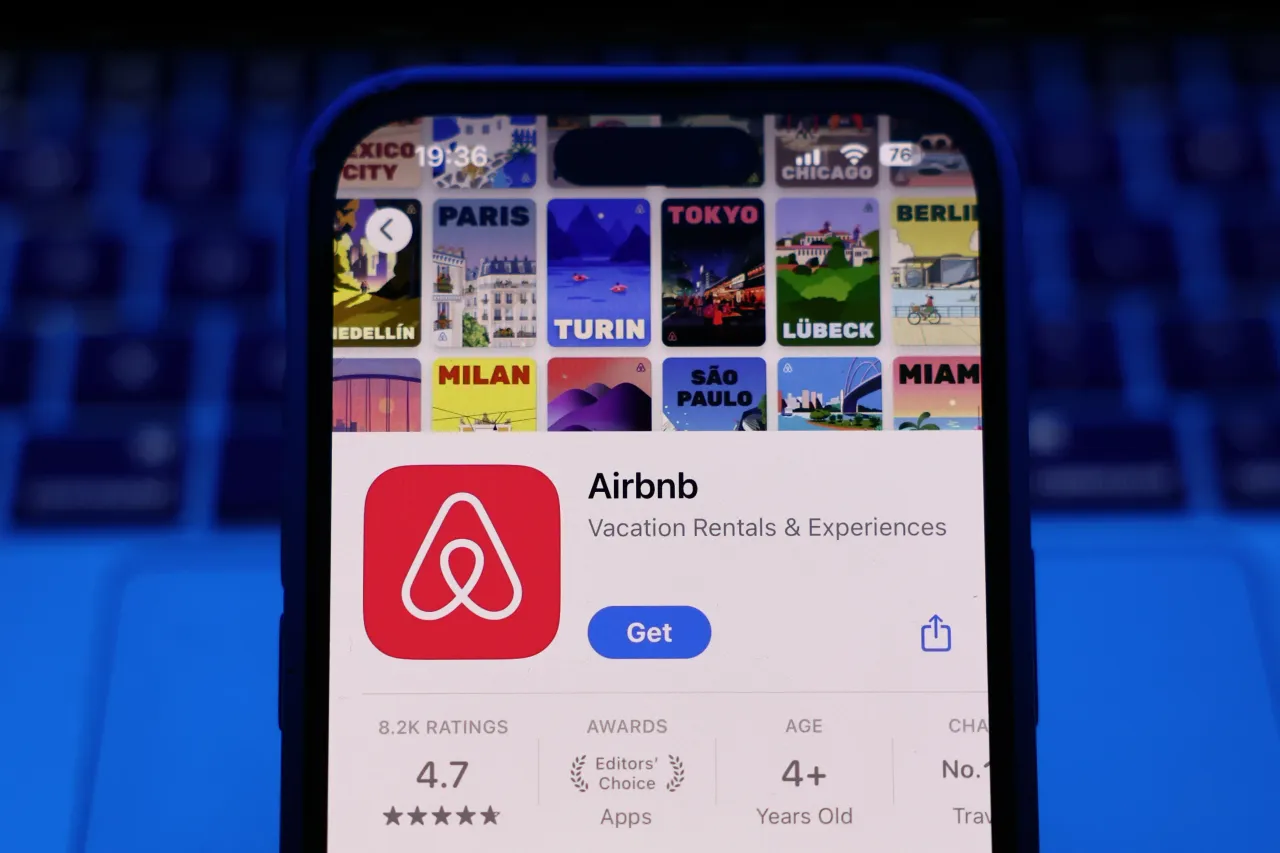 Airbnb on App Store displayed on a phone screen. (Photo by Jakub Porzycki/NurPhoto via Getty Images)