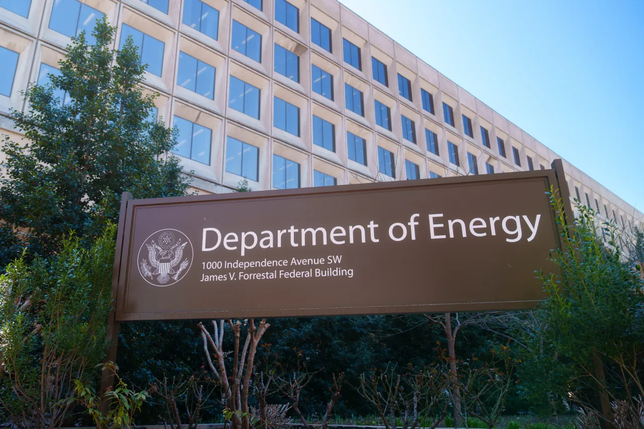 The U.S. Department of Energy building is seen behind a sign marking the location of the agency's headquarters on March 18, 2025, in Washington, DC.