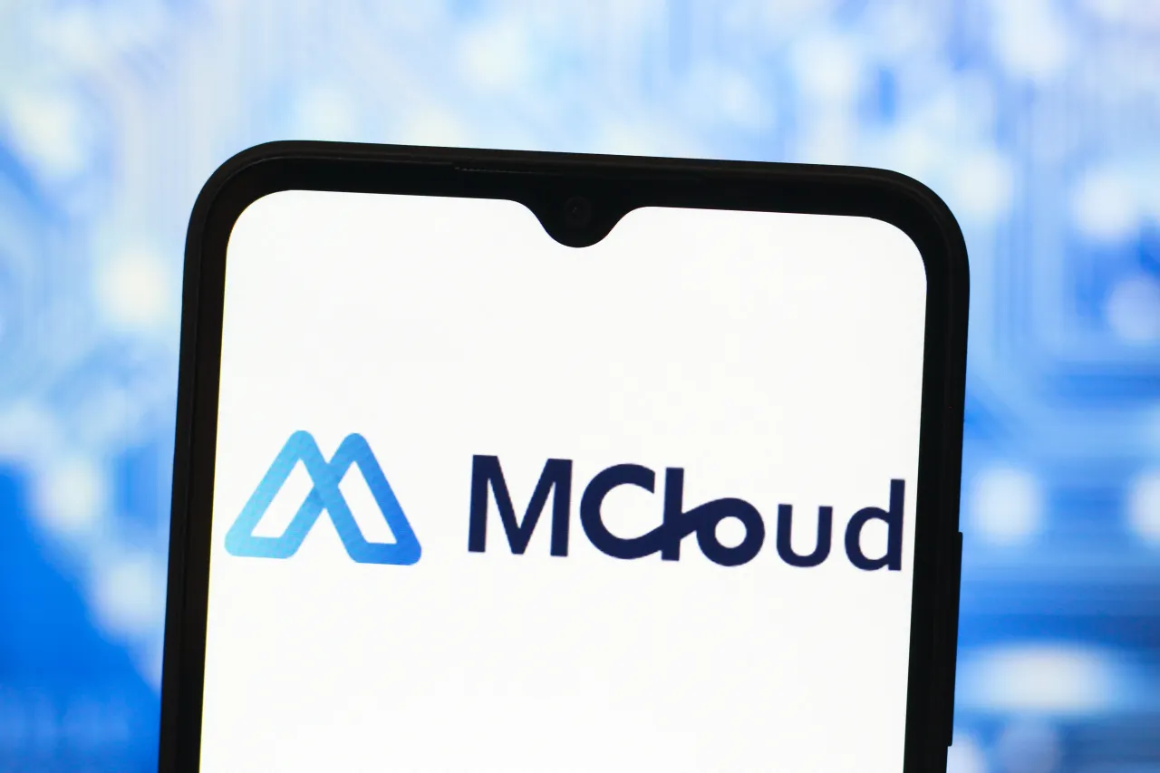 In this photo illustration, the MicroCloud Hologram logo is seen displayed on a smartphone screen.