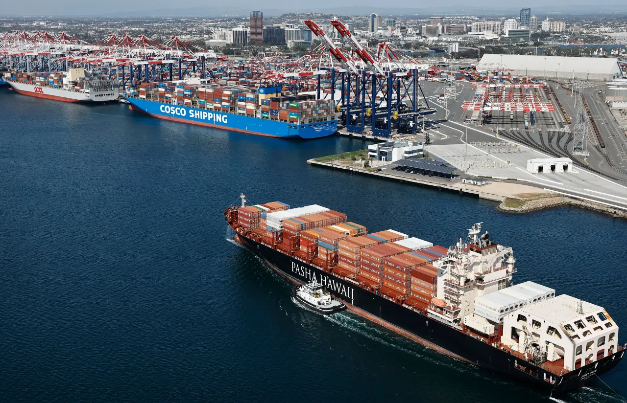 An aerial view of a container ship arriving in the Port of Long Beach near a Cosco Shipping container ship on April 3, 2025 in Long Beach, California. (Photo by Mario Tama/Getty Images)