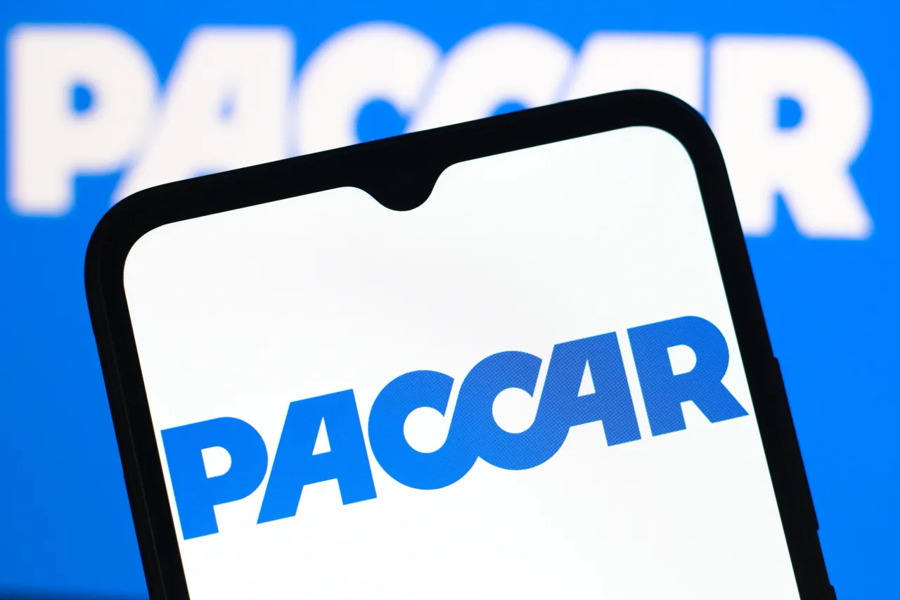 In this photo illustration, the Paccar logo is seen displayed on a smartphone screen. (Photo Illustration by Thomas Fuller/SOPA Images/LightRocket via Getty Images)