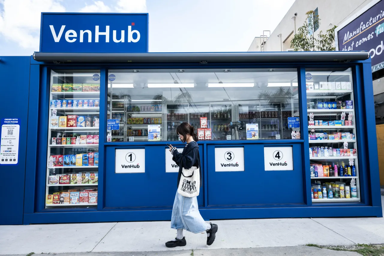 A woman passes VenHub, a robot operated convenience store on Vanowen Street in North Hollywood on Wednesday, April 16, 2025. (Photo by Sarah Reingewirtz/MediaNews Group/Los Angeles Daily News via Getty Images)