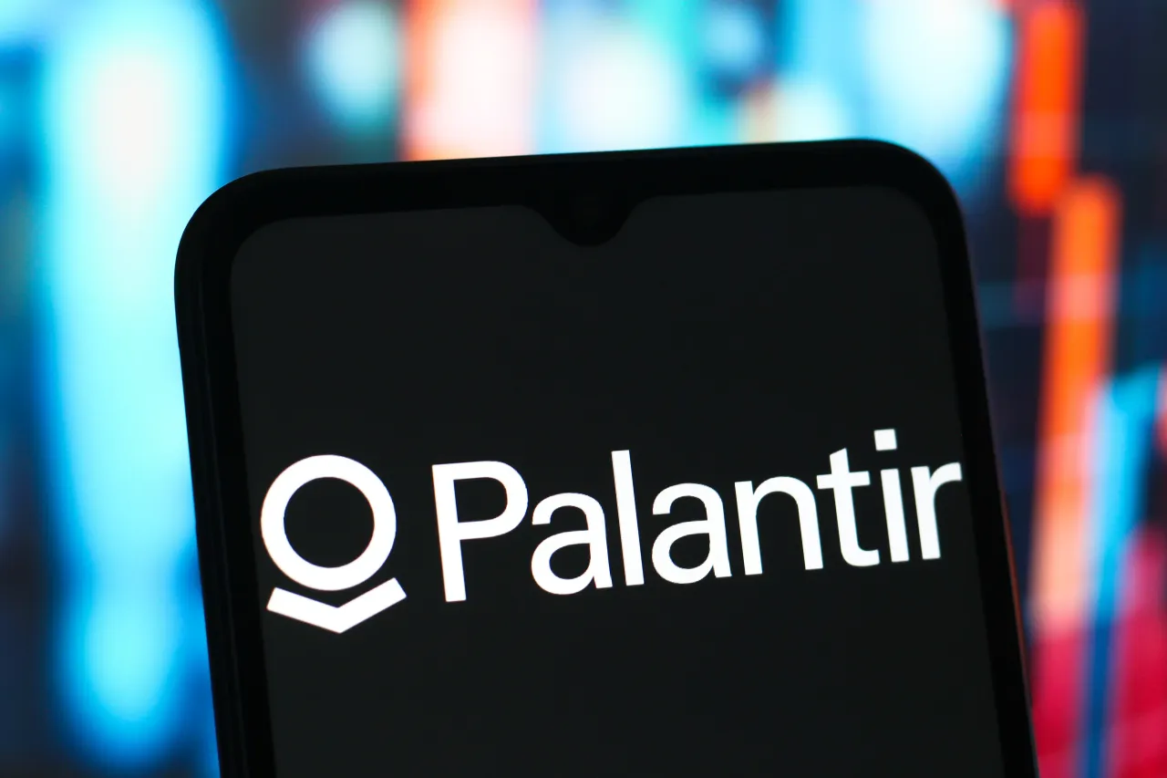 In this photo illustration, the Palantir Technologies logo is seen displayed on a smartphone screen. 