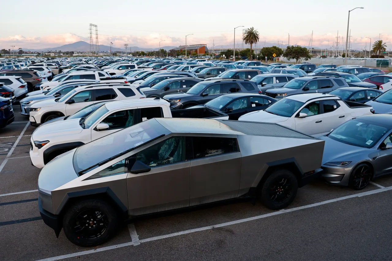 Vehicles, including a Tesla Cybertruck, are parked at the National City Marine Terminal. (Photo by Kevin Carter/Getty Images)
