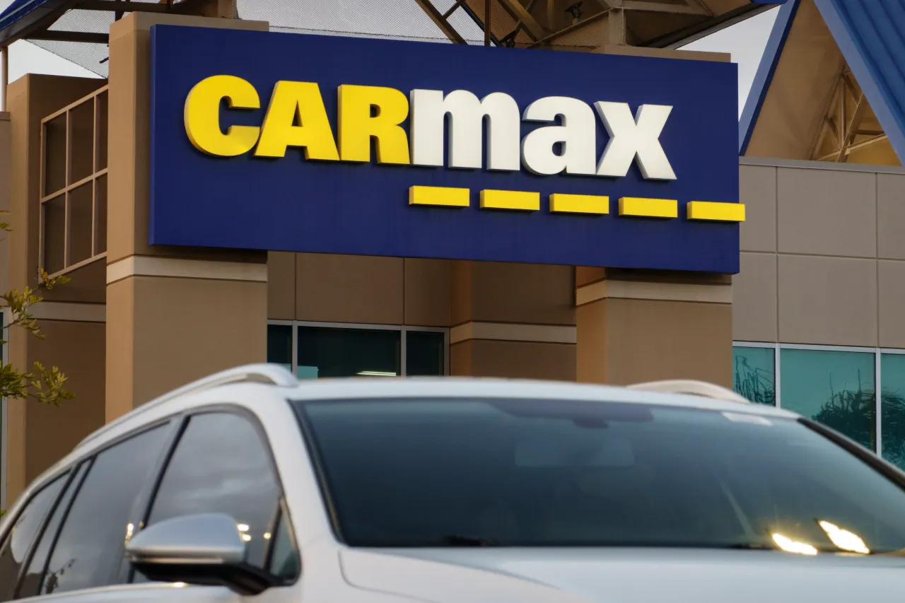 A CarMax logo is displayed at a dealership in San Diego, California. (Photo by Kevin Carter/Getty Images)