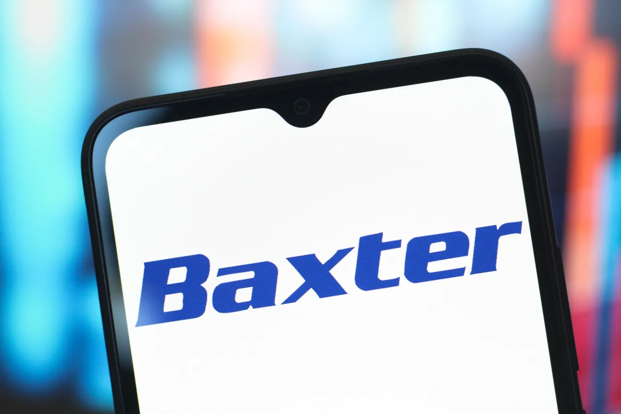 In this photo illustration, the Baxter International logo is seen displayed on a smartphone screen. (Photo Illustration by Thomas Fuller/SOPA Images/LightRocket via Getty Images)