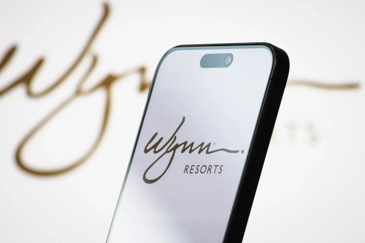 MAY 04: In this photo illustration, the logo of Wynn Resorts Limited is displayed on a smartphone screen. (Photo illustration by Cheng Xin/Getty Images)