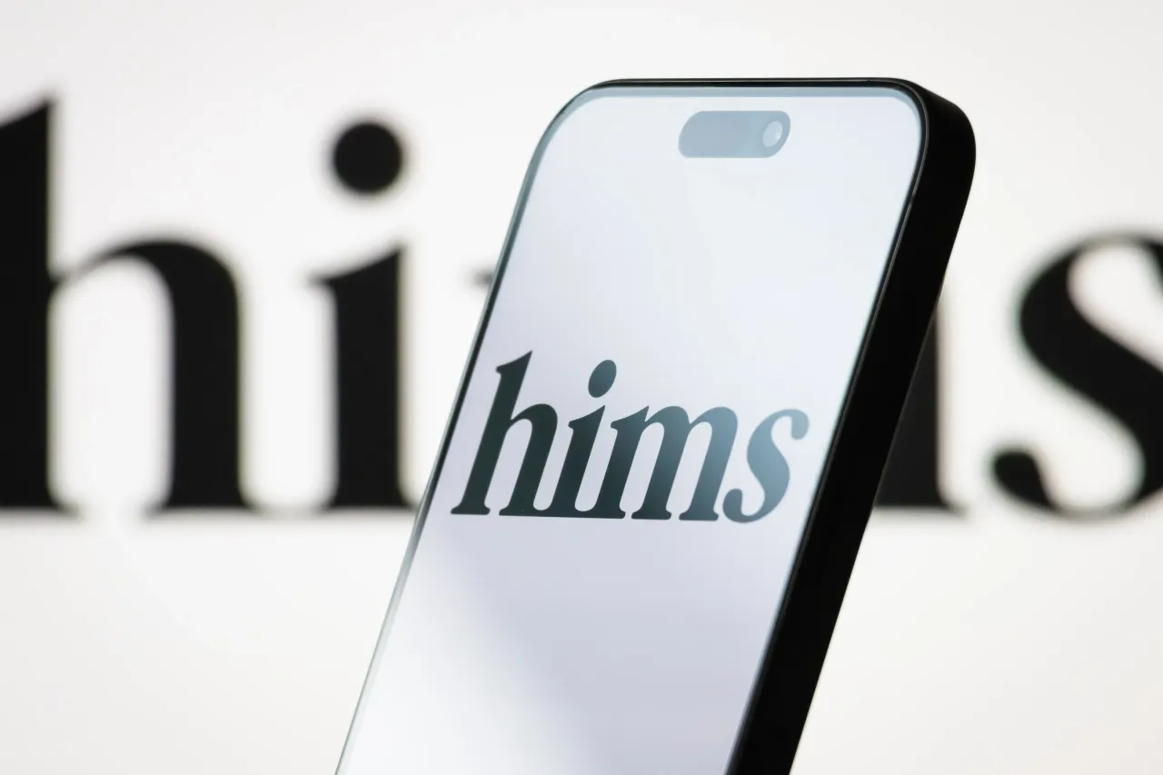 In this photo illustration, the logo of Hims & Hers Health, Inc. is displayed on a smartphone screen on May 04, 2025, in Chongqing, China. (Photo illustration by Cheng Xin/Getty Images)