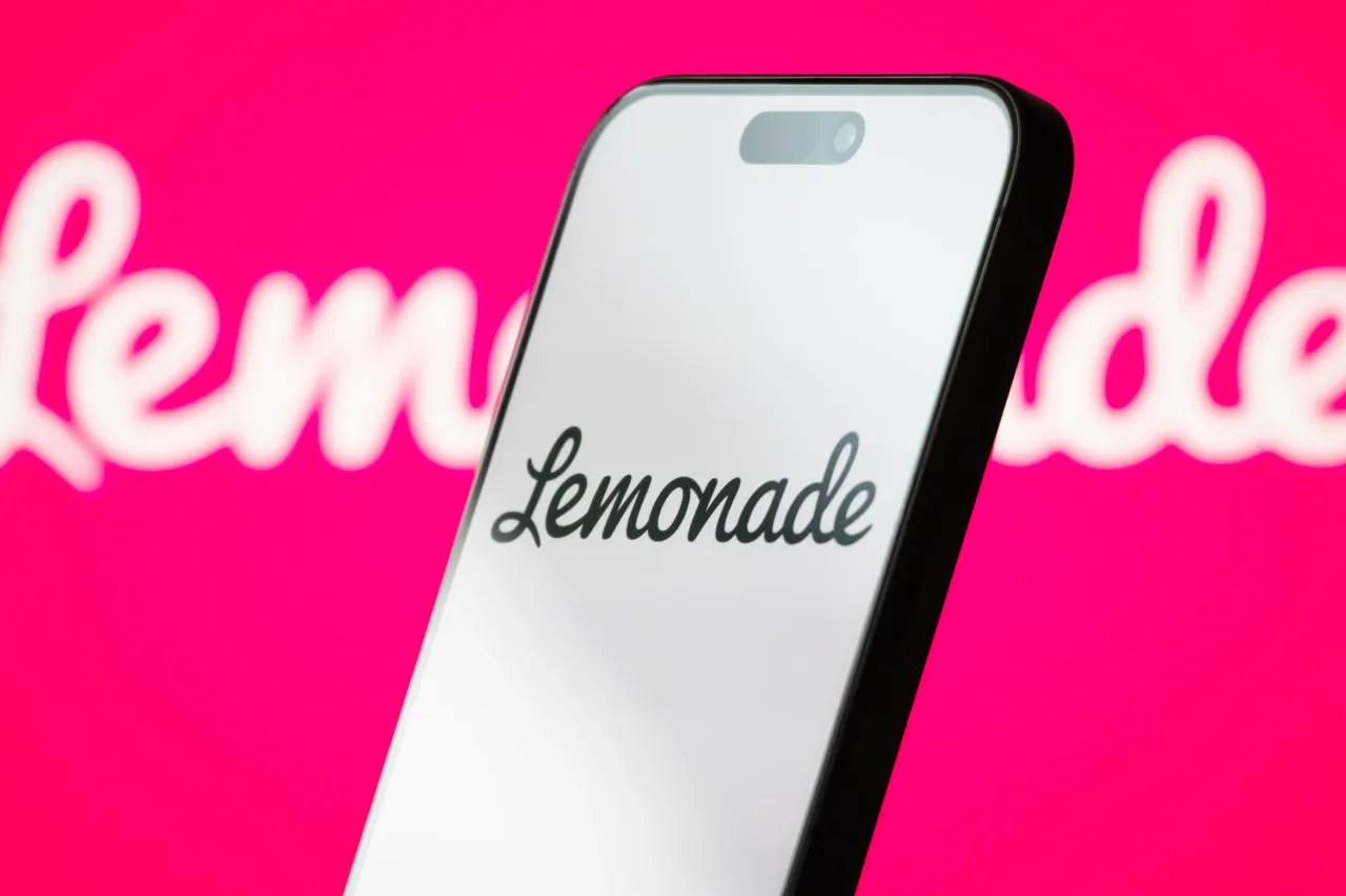 In this photo illustration, the logo of Lemonade, Inc. is displayed on a smartphone screen, with the company's bright pink branding visible in the background, on May 04, 2025, in Chongqing, China.
