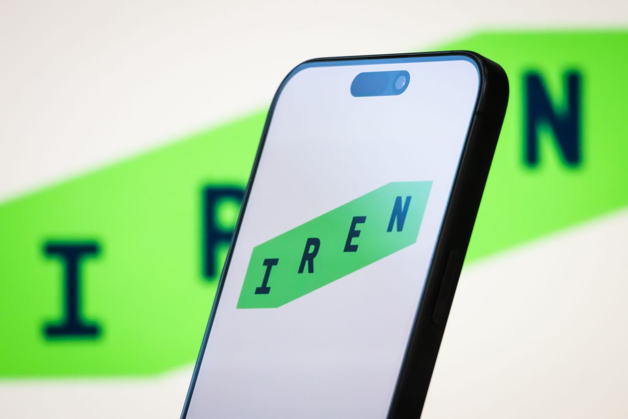 In this photo illustration, the logo of Iris Energy Ltd. is displayed on a smartphone screen, with the company's green branding visible in the background, on May 11, 2025, in Chongqing, China.