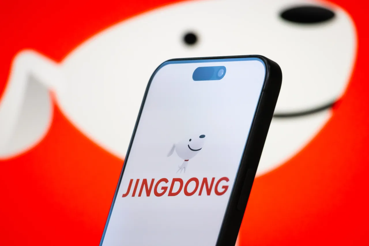 The logo of JD.com, Inc., also known as Jingdong, displayed on a smartphone screen. (Photo illustration by Cheng Xin/Getty Images)
