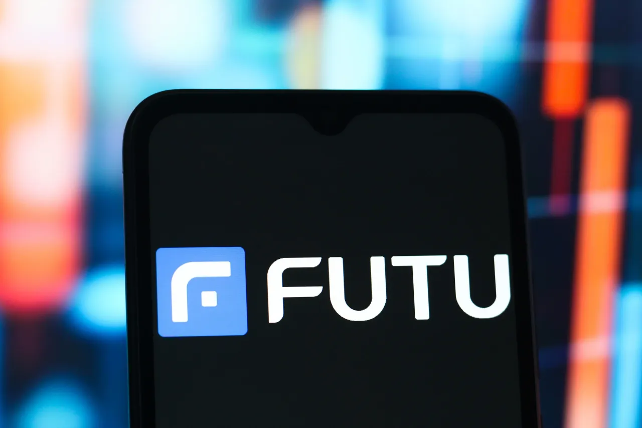 In this photo illustration, the Futu Holdings Limited logo is seen displayed on a smartphone screen.