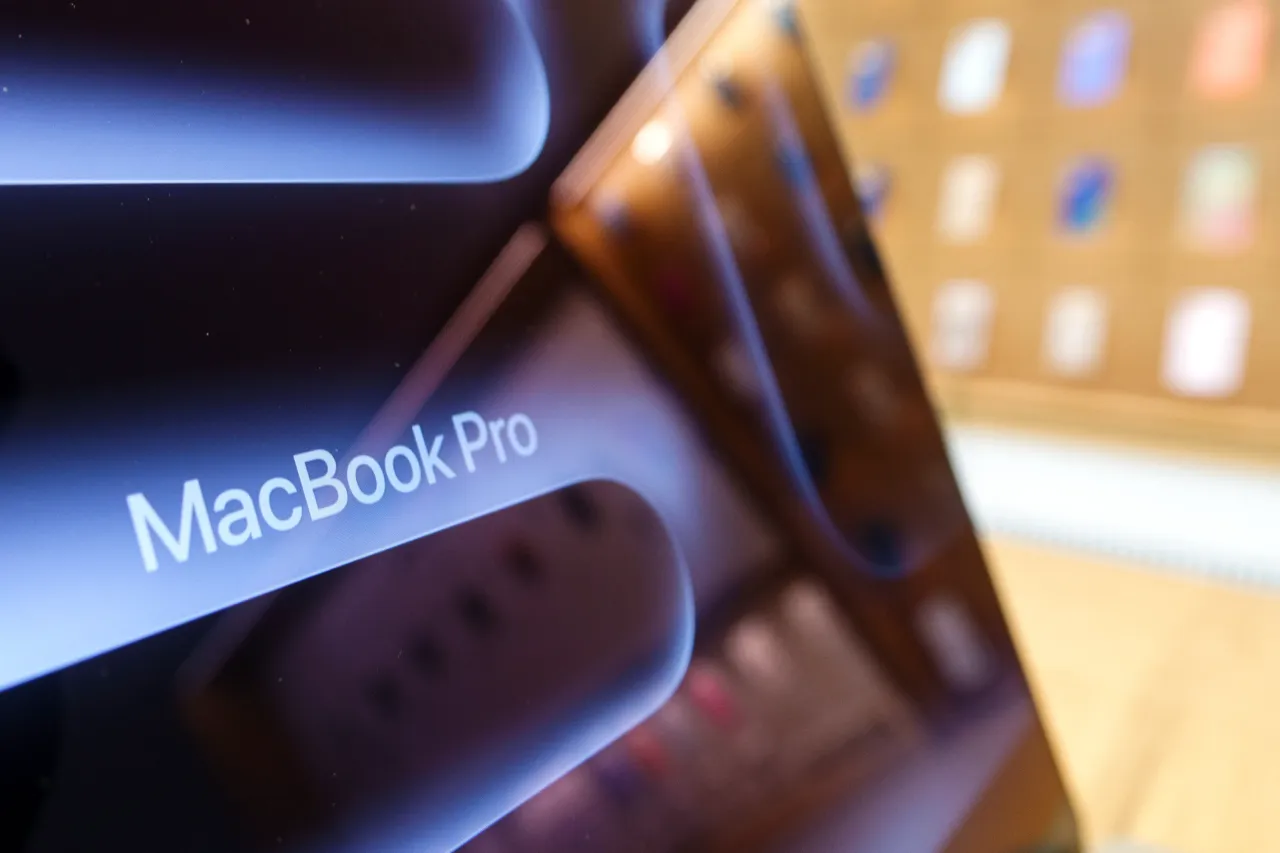 A MacBook Pro is displayed inside of the Apple Carnegie Library store on May 30, 2025 in Washington, DC.