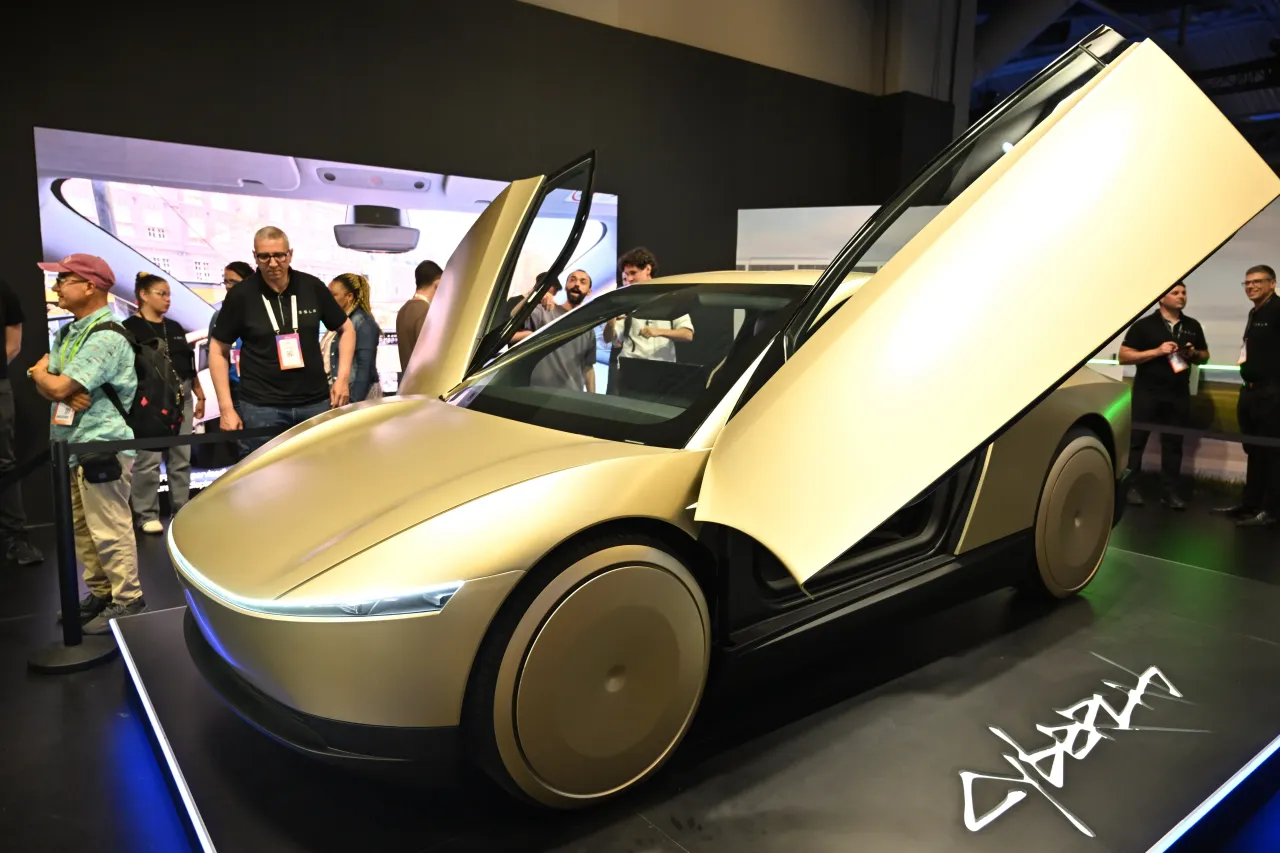 A Tesla Cybercab, also known as the Robotaxi, on display during the 9th edition of the VivaTech technology startup and innovation fair in Paris on June 12, 2025. (Photo by Mustafa Yalcin/Anadolu via Getty Images)