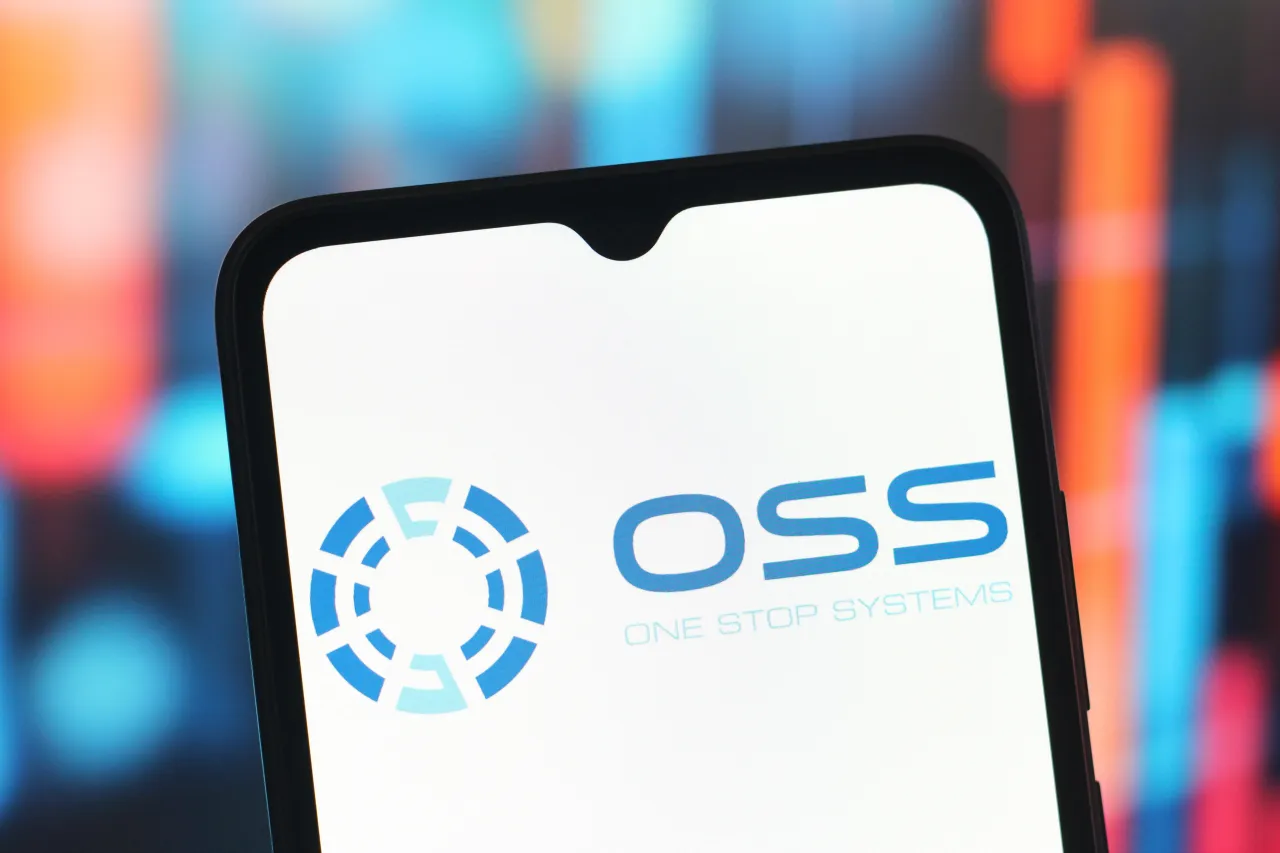 In this photo illustration, the One Stop Systems (OSS) logo is seen displayed on a smartphone screen. (Photo Illustration by Thomas Fuller/SOPA Images/LightRocket via Getty Images)