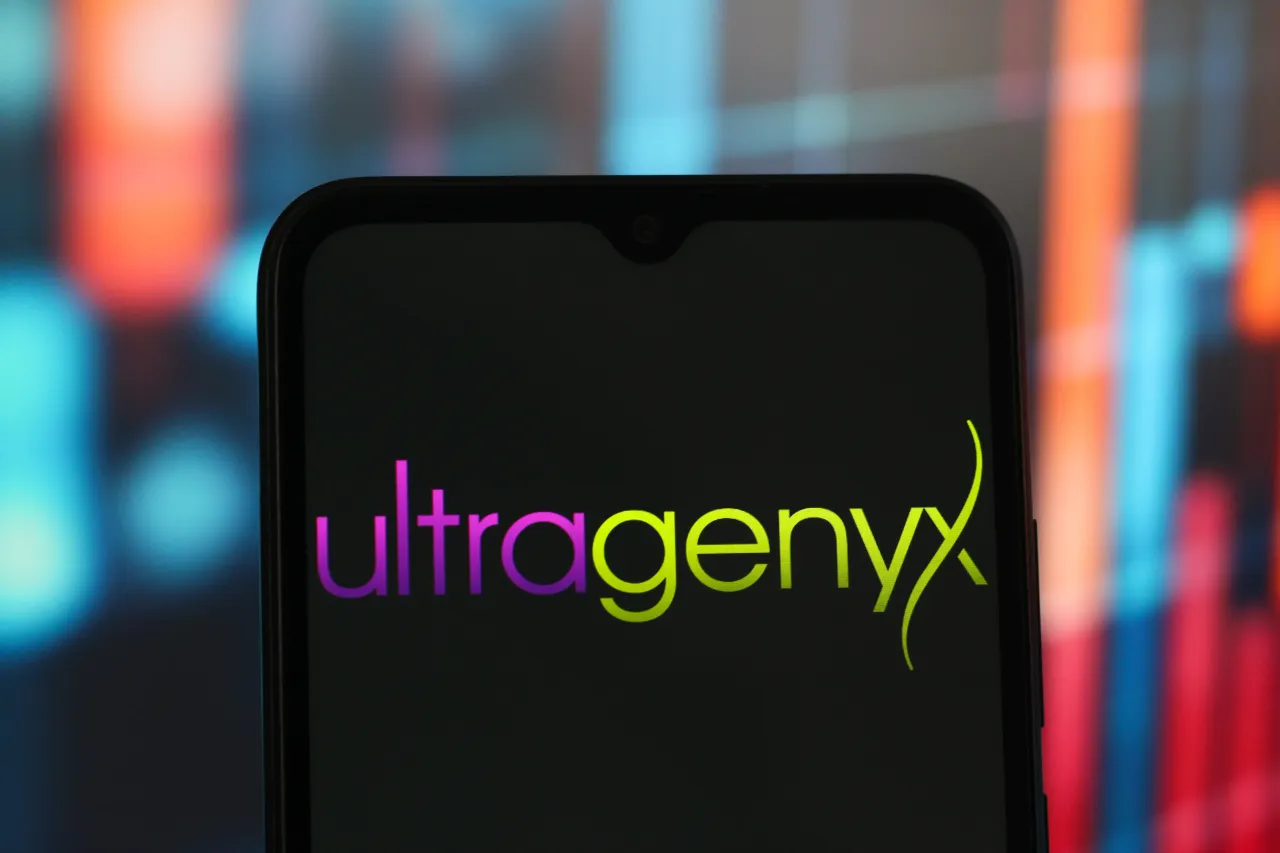 In this photo illustration, the Ultragenyx Pharmaceutical logo is seen displayed on a smartphone screen. (Photo Illustration by Thomas Fuller/SOPA Images/LightRocket via Getty Images)