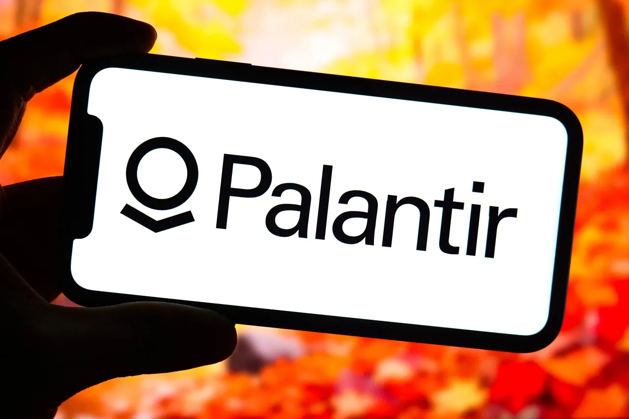 In this photo illustration, the logo of Palantir is seen displayed on the screen of a smartphone.