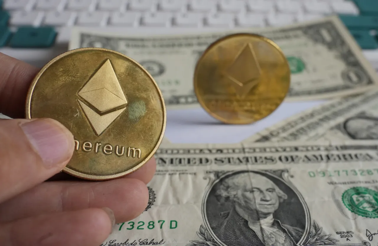 Photos of US dollars and Ethereum coins taken in Shiyan City, Hubei Province, China on June 21, 2025. 