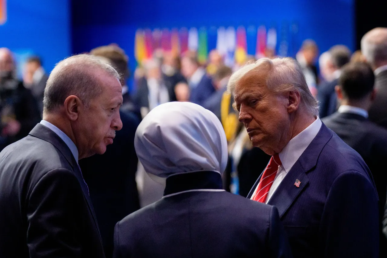 U.S. President Donald Trump (R) speaks with President of the Republic of Turkiye, Recep Tayyip Erdogan (L), and an attendee at a NATO Summit on June 25, 2025 in The Hague, Netherlands. (Photo by Andrew Harnik/Getty Images)