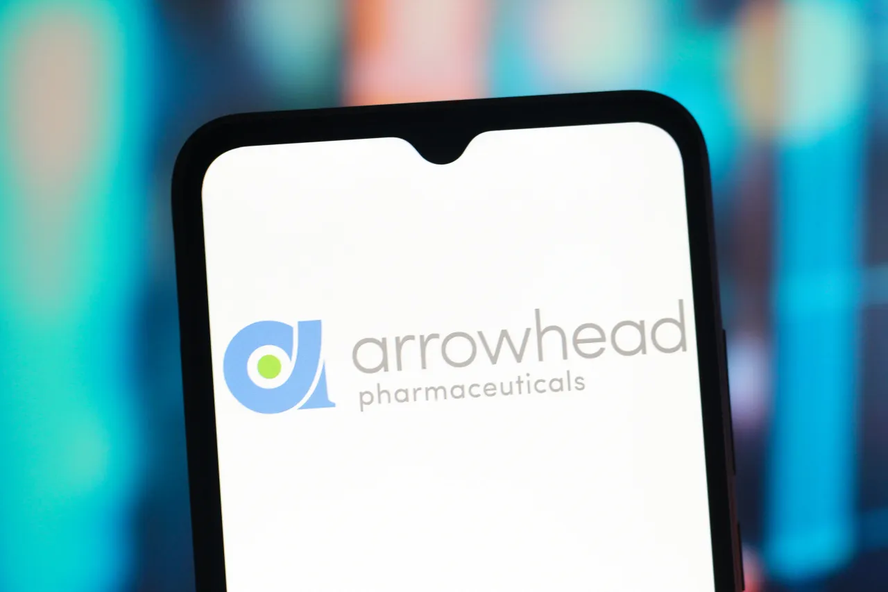 In this photo illustration, the Arrowhead Pharmaceuticals logo is seen displayed on a smartphone screen. (Photo Illustration by Thomas Fuller/SOPA Images/LightRocket via Getty Images)
