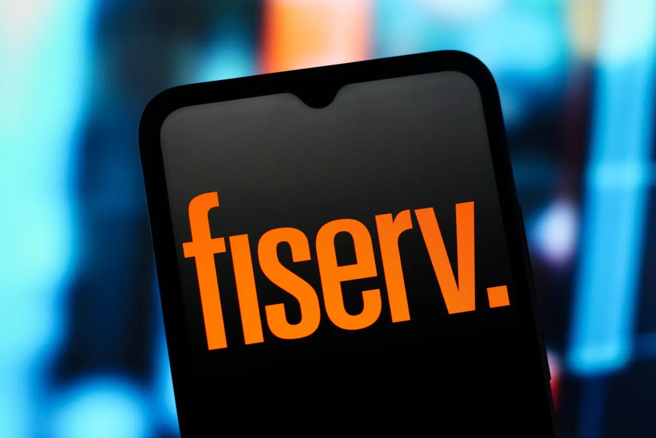 In this photo illustration, the Fiserv logo is seen displayed on a smartphone screen. (Photo Illustration by Thomas Fuller/SOPA Images/LightRocket via Getty Images)