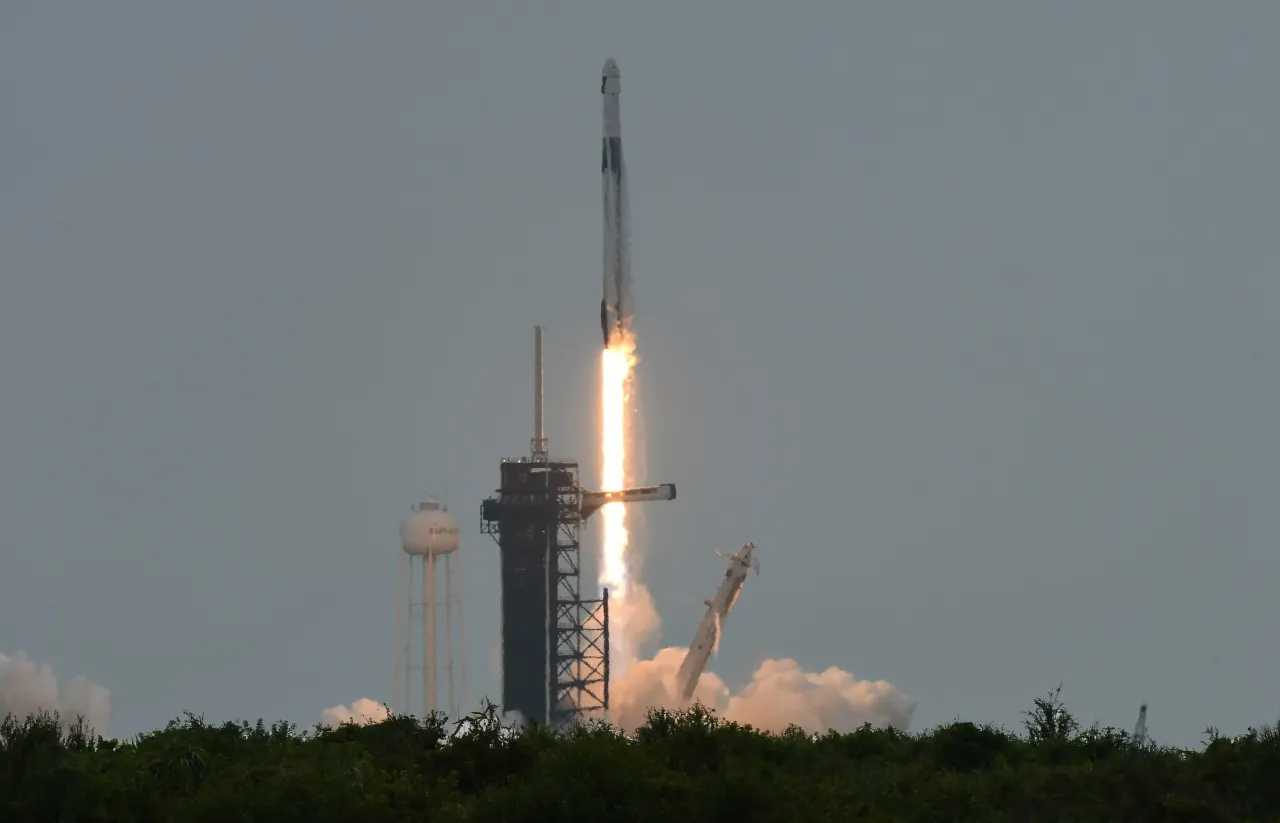 A SpaceX Falcon 9 rocket carrying a Dragon spacecraft launches from pad 39A at the Kennedy Space Center on August 1, 2025. 