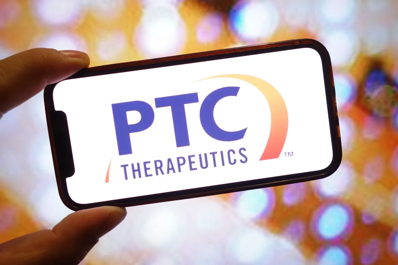 In this photo illustration, a PTC Therapeutics company logo is seen displayed on a smartphone screen. (Photo Illustration by Piotr Swat/SOPA Images/LightRocket via Getty Images)