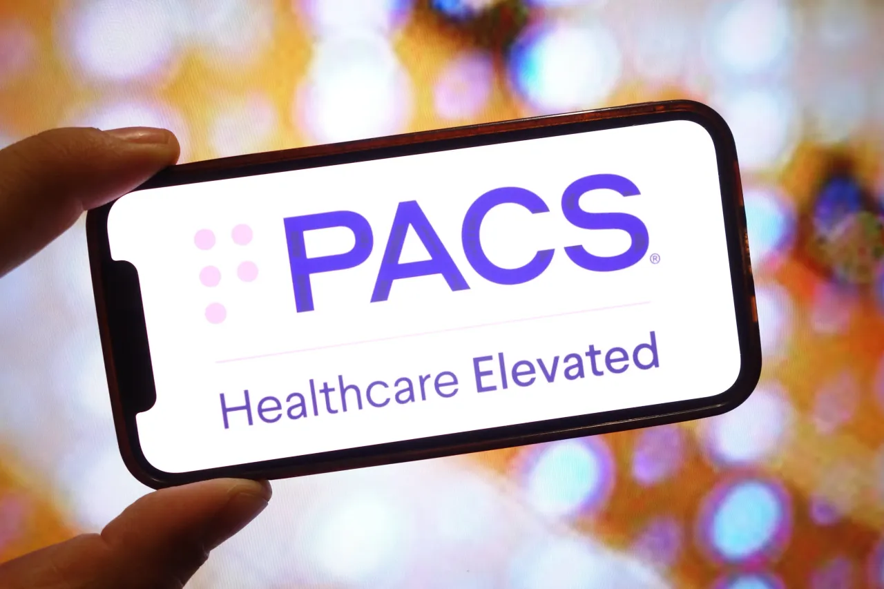 In this photo illustration, a PACS Group company logo is seen displayed on a smartphone screen. (Photo Illustration by Piotr Swat/SOPA Images/LightRocket via Getty Images)