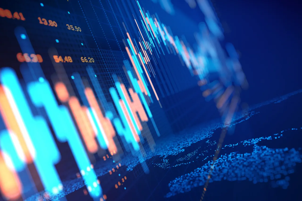 Close up of stock market chart on a glowing particle world map. (Source: Getty Images)