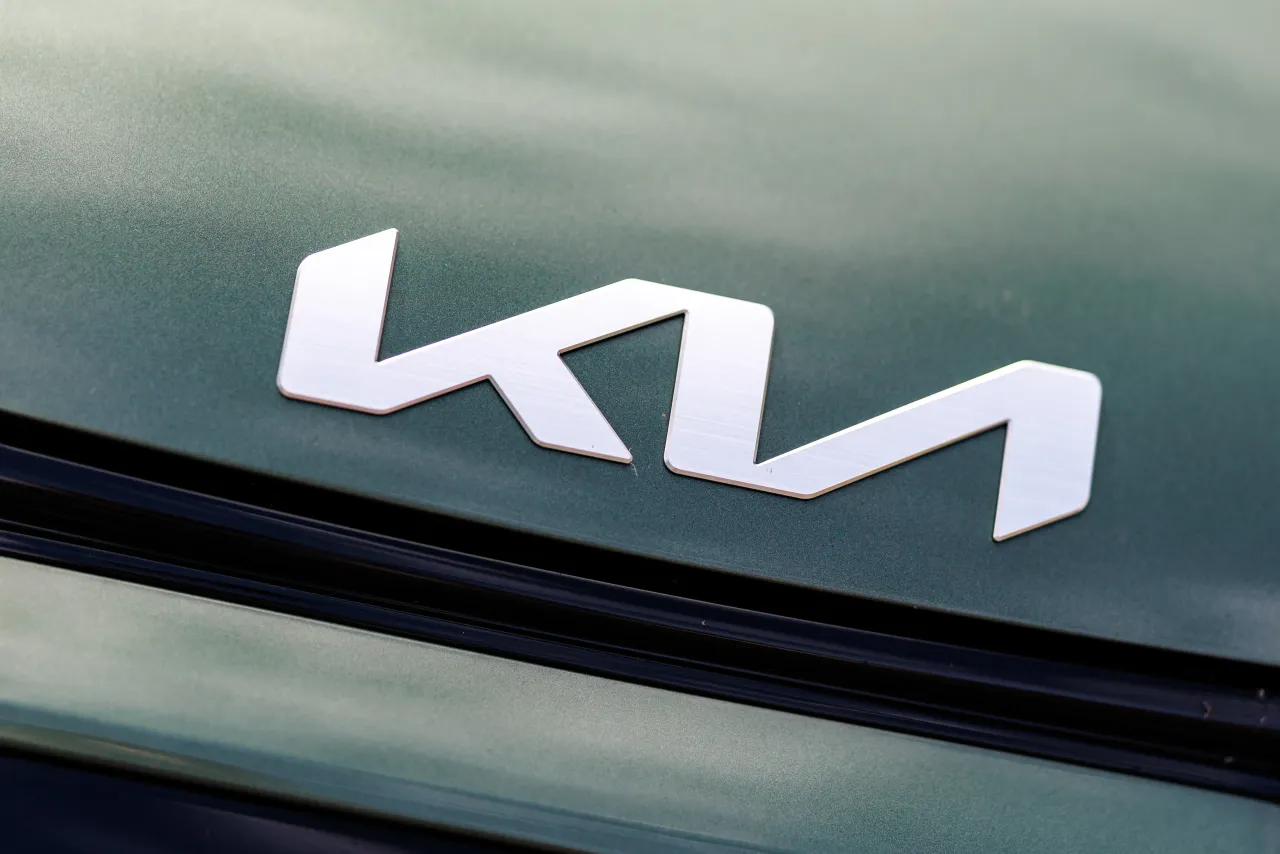 The Kia brand logo can be seen on a vehicle from the manufacturer in Rüthen (North Rhine-Westphalia) on August 5, 2025. (Photo by Matthias Balk/picture alliance via Getty Images)