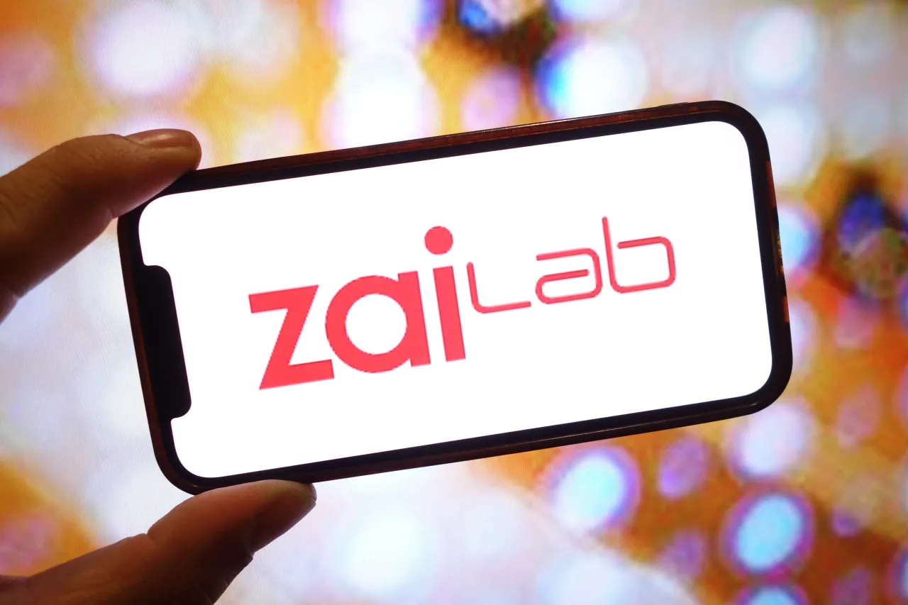 In this photo illustration, a Zai Lab company logo is seen displayed on a smartphone screen. (Photo Illustration by Piotr Swat/SOPA Images/LightRocket via Getty Images)