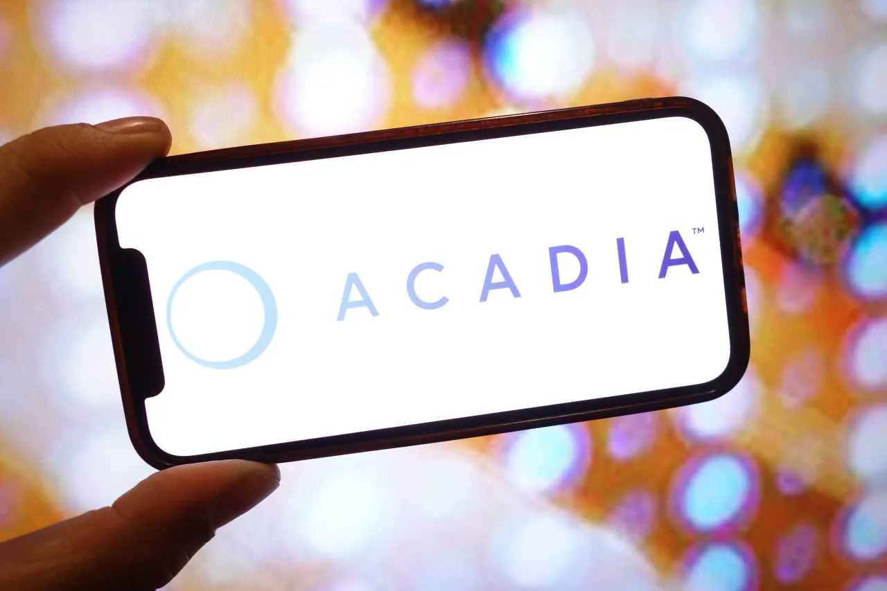 In this photo illustration, an Acadia Pharmaceuticals company logo is seen displayed on a smartphone screen. (Photo Illustration by Piotr Swat/SOPA Images/LightRocket via Getty Images)