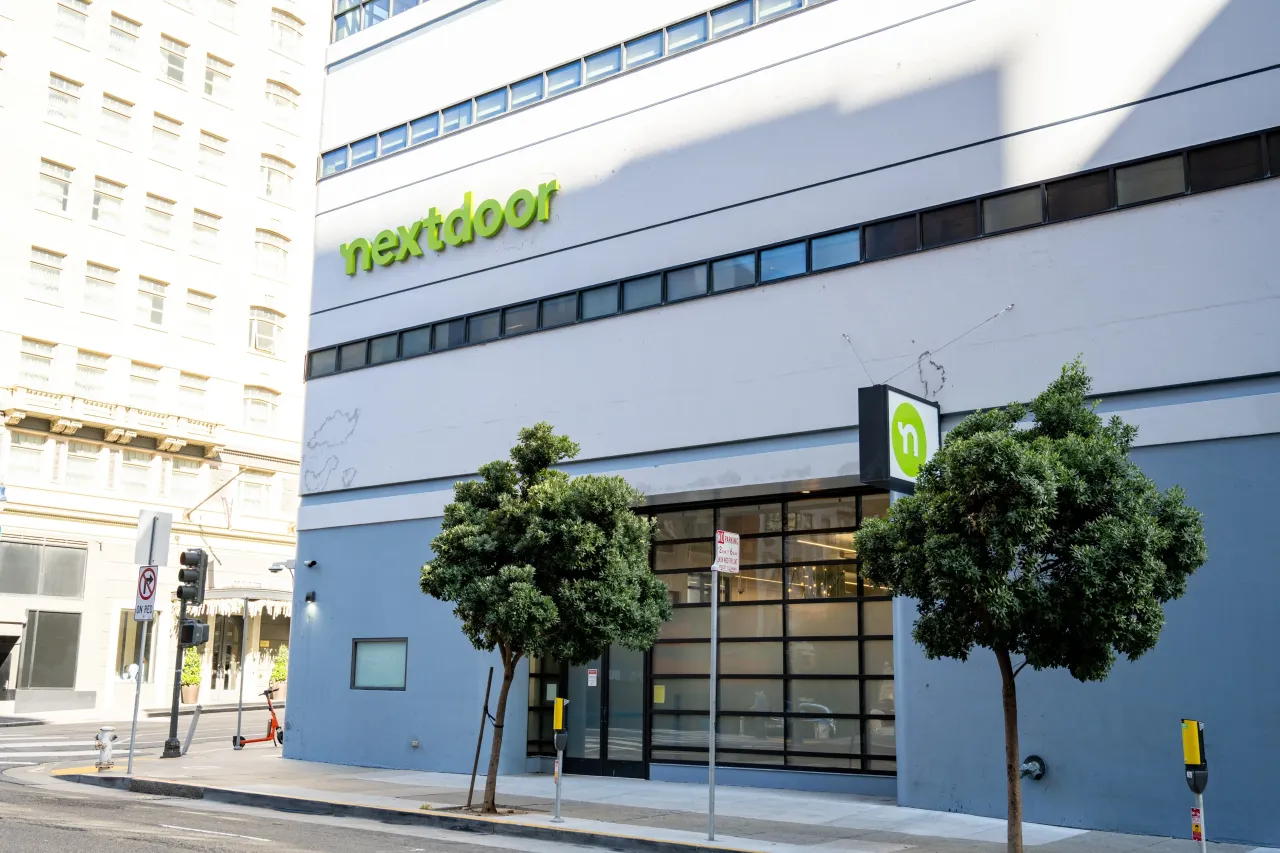 Exterior of Nextdoor office building with green logo signage in San Francisco, California. (Photo by Smith Collection/Gado/Getty Images)