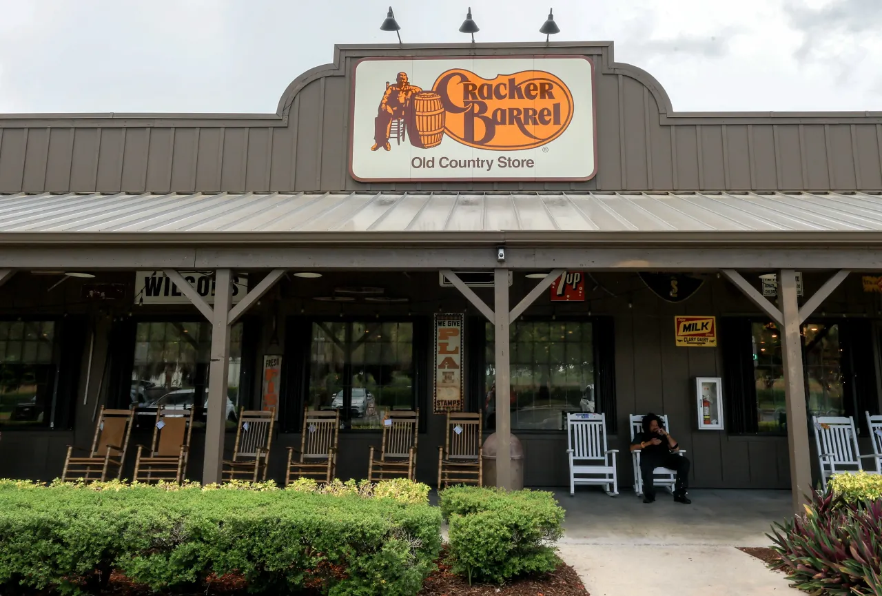 A Cracker Barrel sign featuring the old logo hangs on the outside of a restaurant on August 21, 2025 in Homestead, Florida. (Photo by Joe Raedle/Getty Images)