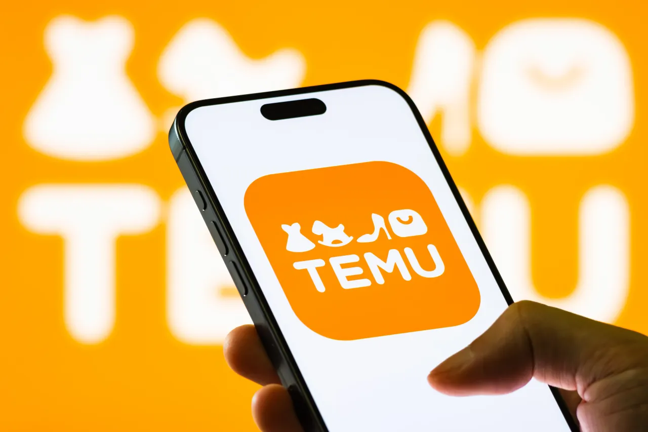 Temu logo displayed on a smartphone screen. (Photo illustration by Cheng Xin/Getty Images)