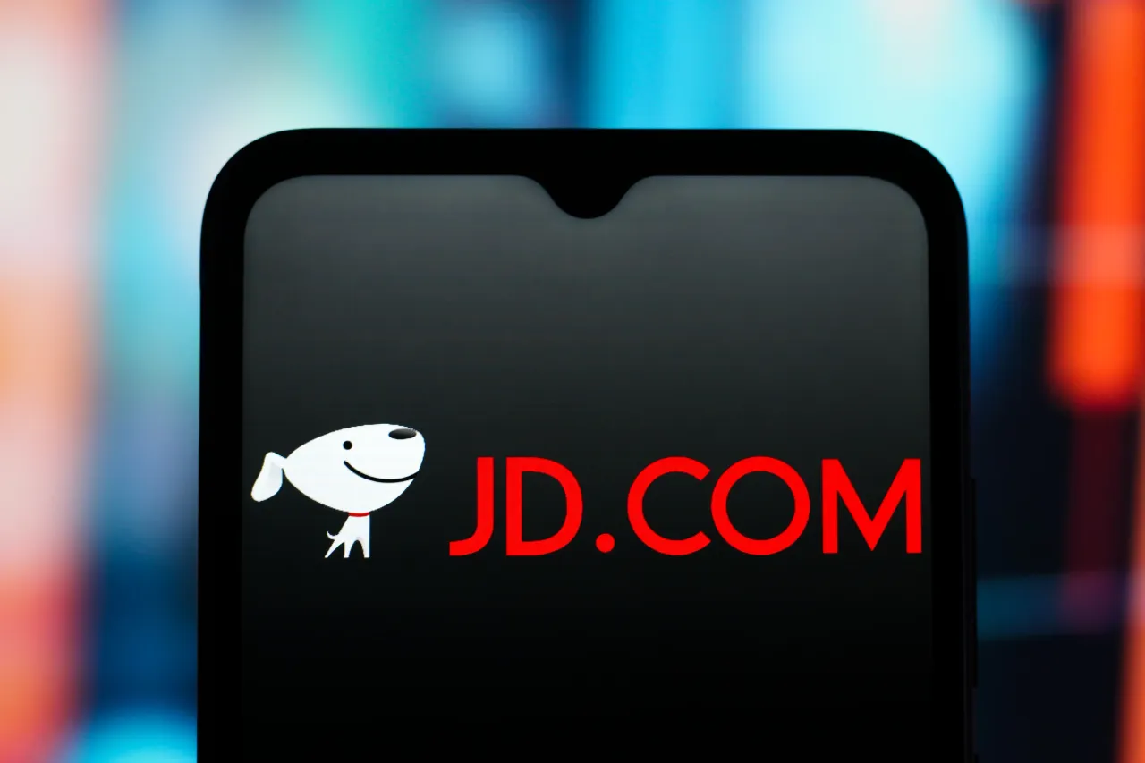 The JD.com (Jing Dong) logo is seen displayed on a smartphone screen. (Photo Illustration by Thomas Fuller/SOPA Images/LightRocket via Getty Images)