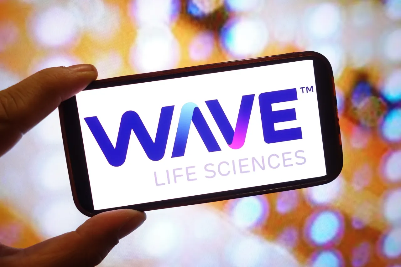 In this photo illustration, a Wave Life Sciences company logo is seen displayed on a smartphone screen. (Photo Illustration by Piotr Swat/SOPA Images/LightRocket via Getty Images)