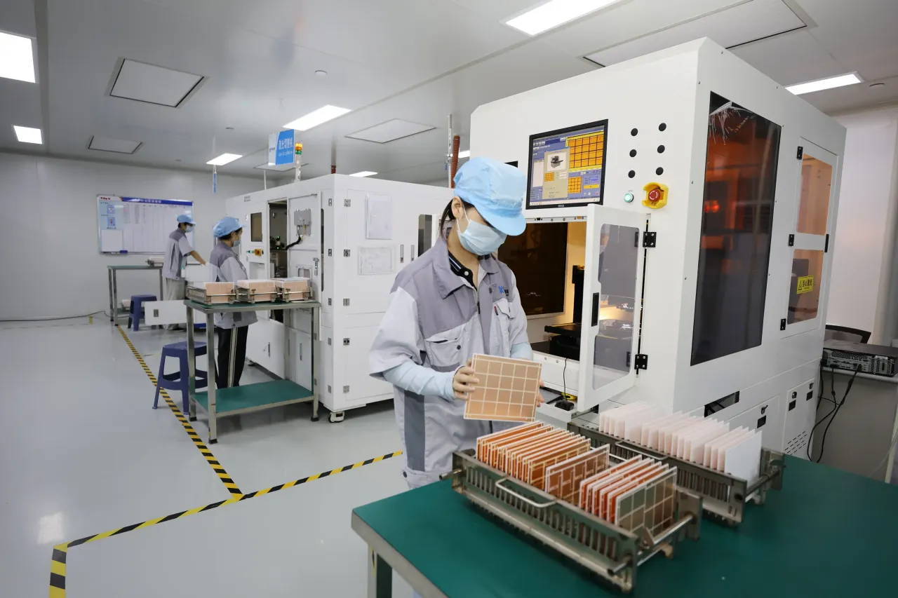 An employee works on the production line of semiconductors on September 8, 2025 in Huangshan, Anhui Province of China. (Photo by VCG/VCG via Getty Images)