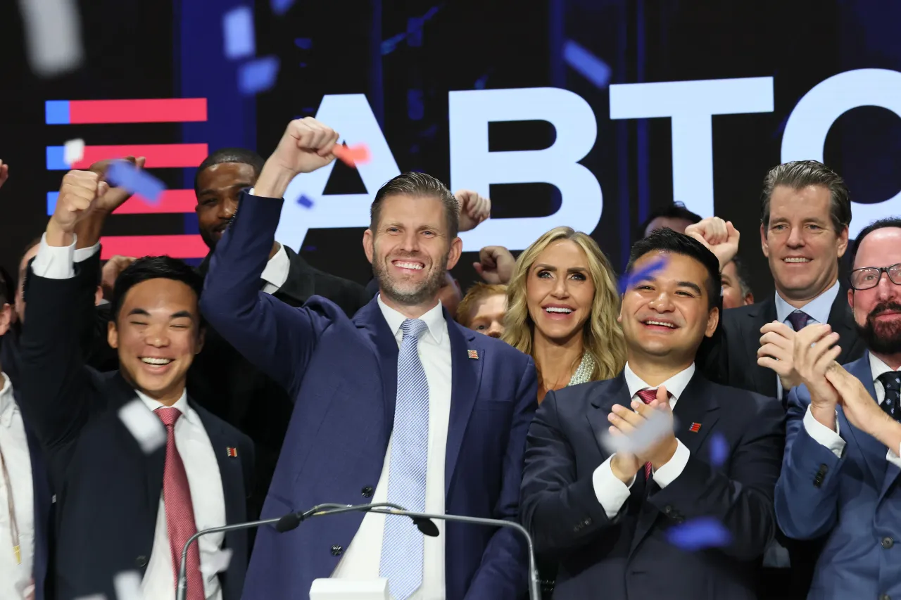 Trump and Genoot rang the opening bell as they celebrate the listing of American Bitcoin (ABTC) at Nasdaq. (Photo by Michael M. Santiago/Getty Images)