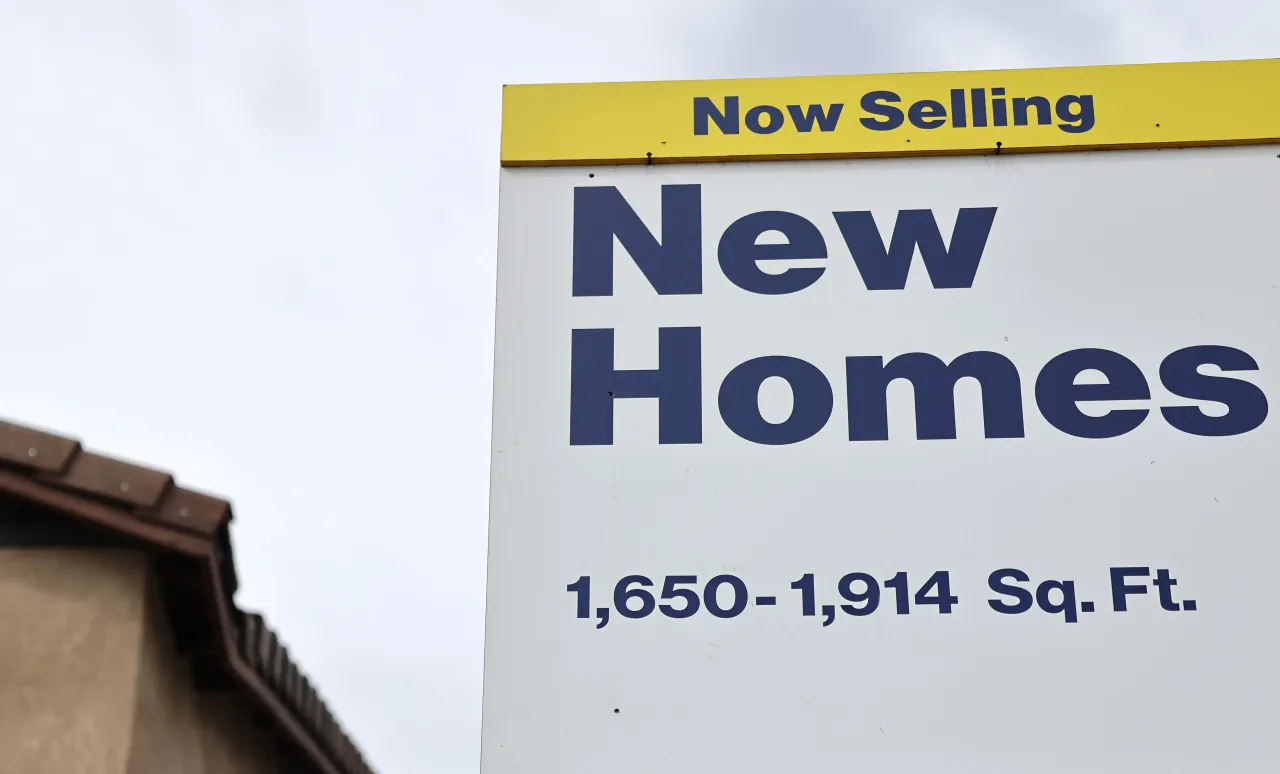 A sign advertises new homes in a gated community in Fontana, California. Shares of Better Home surged nearly 47% on Monday. (Photo by Mario Tama/Getty Images)