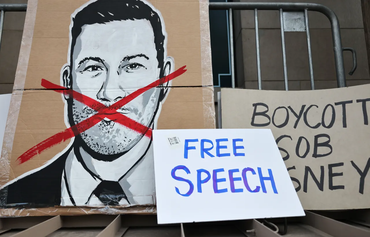 Signs left by demonstrators protesting the suspension of the "Jimmy Kimmel Live!" show outside the El Capitan Entertainment Centre in Los Angeles, California on September 18, 2025. (Photo by Mario Tama/Getty Images)
