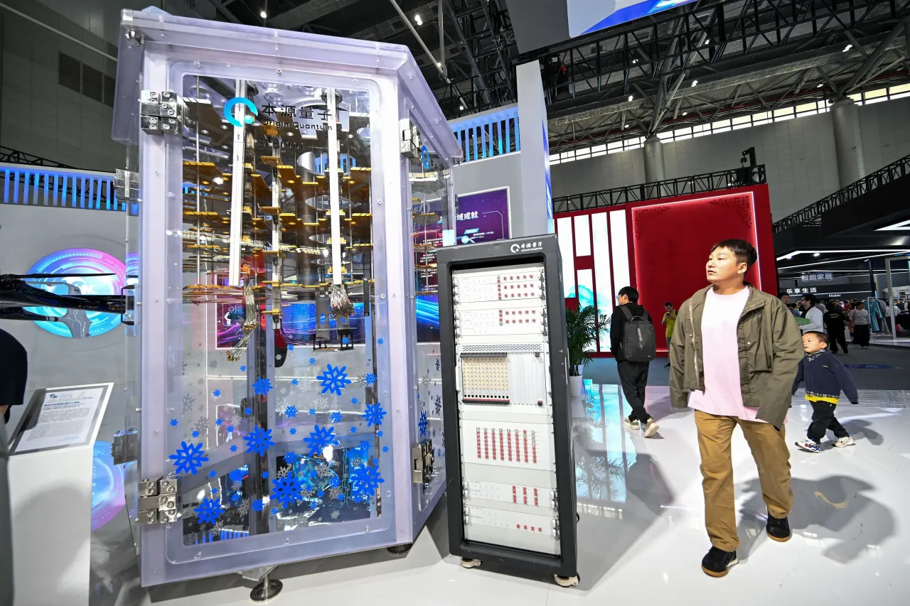 A visitor passes by a model of the Generation Four quantum computer from Origin Quantum during an exhibition in China Sept. 20, 2025. (Photo credit should read FANG DONGXU / Feature China/Future Publishing via Getty Images)