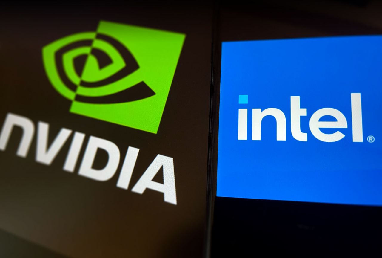 The Intel logo is displayed on a smartphone screen with the Nvidia logo in the background. (Photo by VCG/VCG via Getty Images)