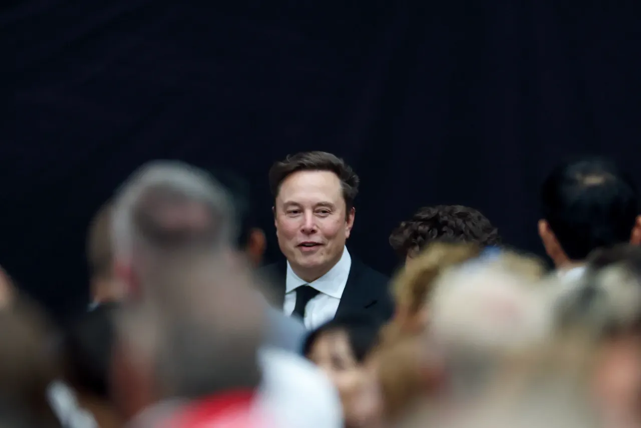 Tesla CEO Elon Musk attends the memorial service for political activist Charlie Kirk at State Farm Stadium on September 21, 2025 in Glendale, Arizona. (Photo by Joe Raedle/Getty Images)