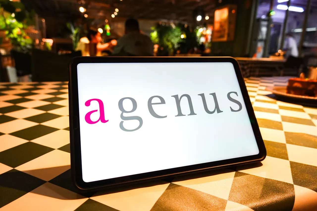 In this photo illustration, the Agenus logo is displayed on the screen of the tablet. (Photo Illustration by Sheldon Cooper/SOPA Images/LightRocket via Getty Images)